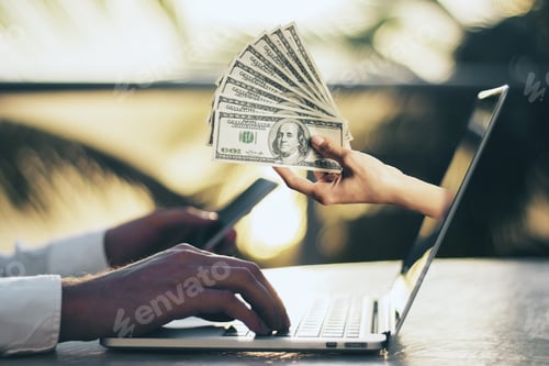 Preview: Hand With Dollars Sticking Out Of Laptop Screen. Cryptocurrency And Finance Concept