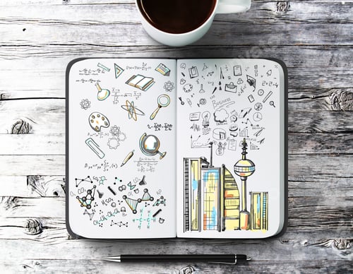 Preview: Top View Of Aged Wooden Desktop With Coffee Cup, Pen And Creative Sketch In Notepad