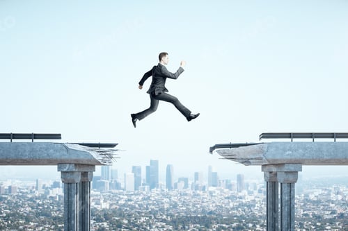 Preview: Businessman Jumping Over Gap In Bridge On Megapolis City View Background. Business And Challenge