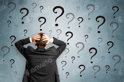 Preview: Worried Businessman With Question Marks. Confusion And Enquiry Concept