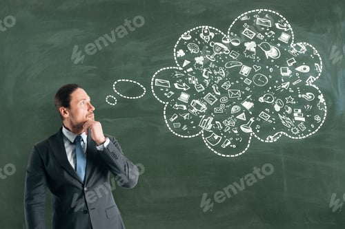 Preview: Thoughtful Young Businessman With Creative Business Thought Cloud Sketch On Chalkboard Background