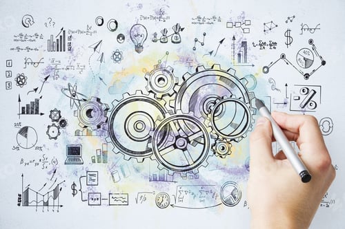 Preview: Businessman Hand Drawing Cogwheel And Business Sketch. Teamwork And Startup Concept.
