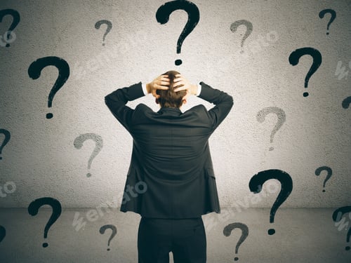 Preview: Back View Of Young Businessman On Concrete Wall Background With Question Marks. Confusion And