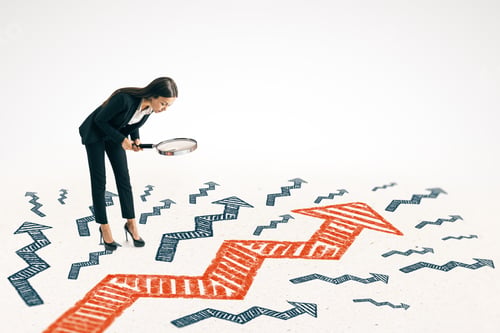 Preview: Young Woman Using Magnifier To Look At Drawn Arrow On White Background. Research And Growth Concept