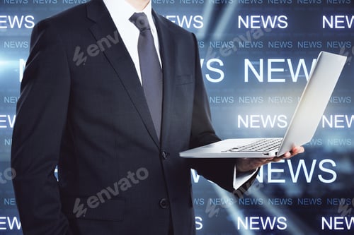 Preview: Businessman Holding A Laptop, News Hologram In The Background, Global News And Information Concept