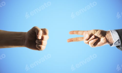 Preview: Two Hands Fist And Victory Sign On Blue Background. Business And Challenge Concept. Close Up