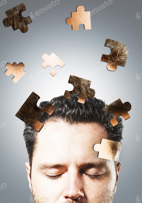Preview: Puzzle Headed Businessman On Gray Background. Confusion And Think Concept
