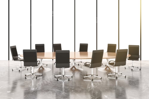 Preview: Conference Room With Round Wooden Table, Chairs And Concrete Floor 3D Render