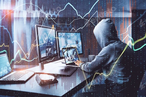 Preview: Side View Of Unrecognizable Hacker At Desktop Using Computers With Forex Chart On Blurry Office