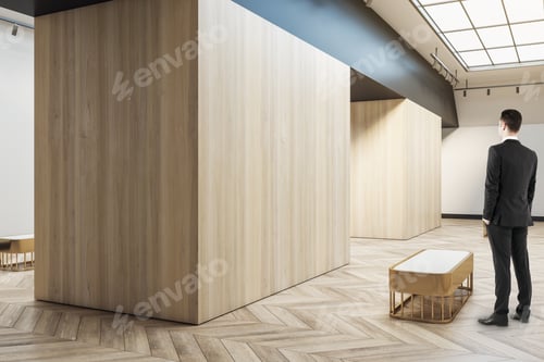 Preview: Man Standing In Modern Wooden Exhibition Hall Interior With Sunlight From Ceiling Window, Mock Up