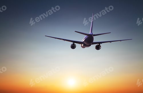 Preview: Airplane Flying At Sunset