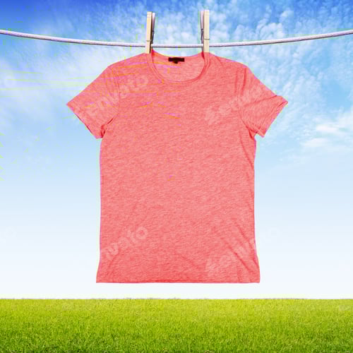 Preview: T-Shirt Hung On Clothesline Against Blue Sky