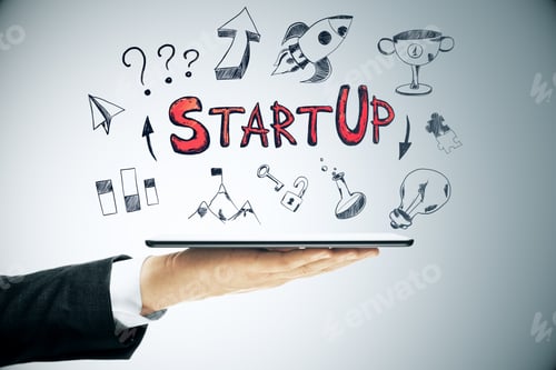 Preview: Hand Holding Tablet With Abstract Business Plan. Business And Startup Concept. Close Up