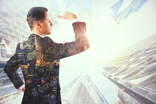 Preview: Side View Of Attractive Young Businessman Looking Into The Distance On Abstract City Background