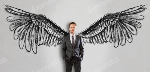 Preview: Handsome Businessman In Suit On Concrete Background With Creative Drawn Wings. Freedom Concept