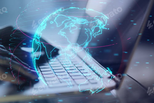 Preview: Close Up Of Hand Using Laptop Computer At Desktop With Glowing Digital Blue Globe Hologram On