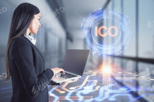 Preview: Businesswoman With A Tablet Touches A Hologram With Ico Letters In An Office Corridor, Trade And