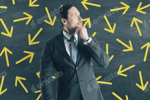 Preview: Portrait Of Thoughtful Young European Businessman With Arrows. Choice And Solution Concept