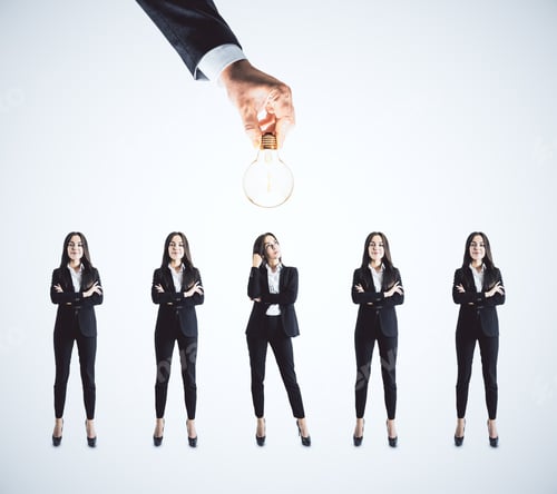 Preview: Five Businesswoman And Hand Holding Lamp. Innovation And Start Up Concept