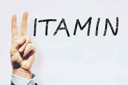 Preview: Hand With Peace Sign Gesture Replacing Letter V In Vitamin Word On White Background With Mock Up