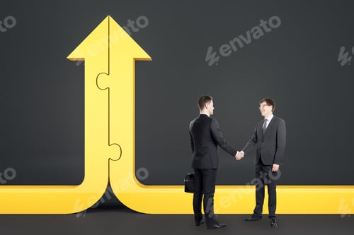 Preview: Businessmen Shaking Hands And Yellow Arrow Shape Puzzle. Partnership And Success Concept.