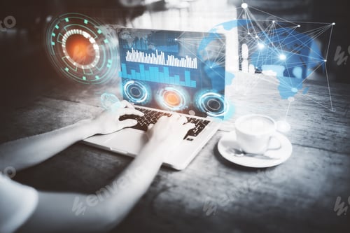 Preview: Side View Of Man Hands Using Laptop With Digital Business Hologram Placed On Wooden Cafe Table With