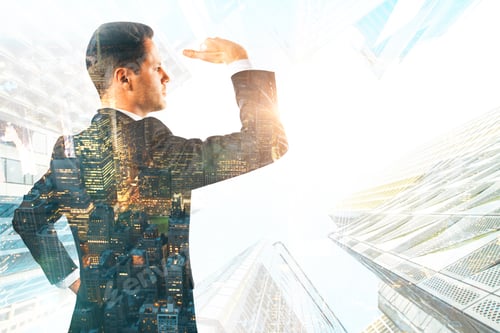 Preview: Side View Of Attractive Young Businessman Looking Into The Distance On Abstract City Background