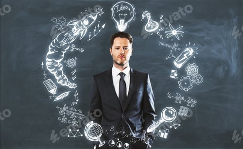 Preview: Handsome European Businessman Standing On Chalkboard Background With Business Sketch. Startup And