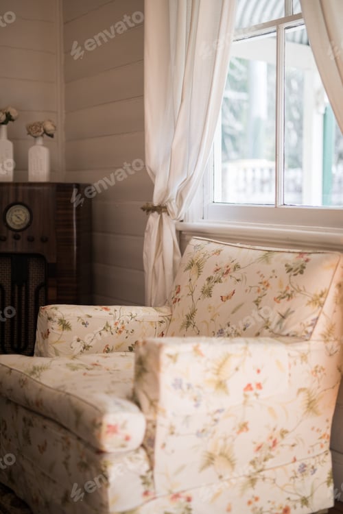Preview: Old Floral Fabric Comfortable Arm Chair In A Old Charming Timber Cottage Home Lounge Room With