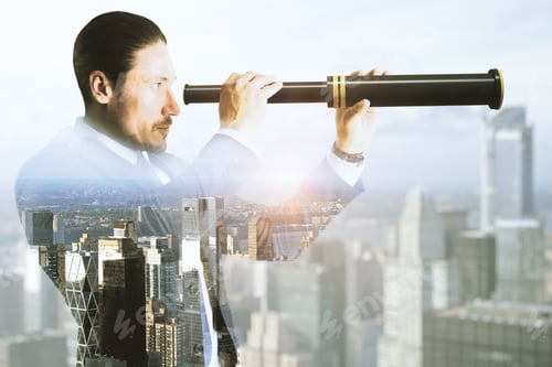 Preview: Side View Of Young Businessman Using Binoculars To Look Into The Future On Abstract City