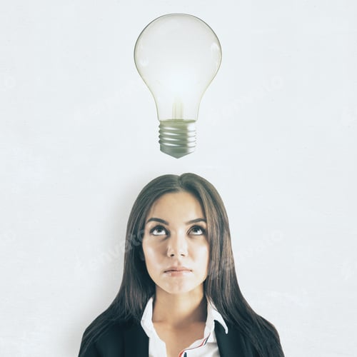 Preview: Portrait Of Attractive Young Businesswoman With Lamp On Light Background. Idea And Innovation