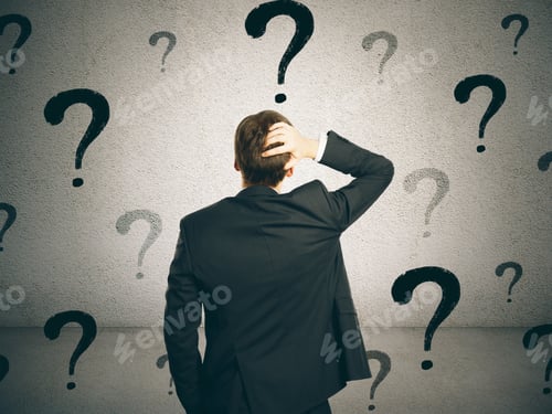 Preview: Back View Of Young Businessman On Concrete Wall Background With Question Marks. Confusion And Doubt