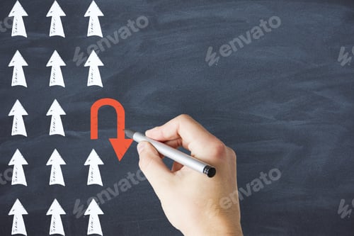 Preview: Businessman Hand With Pen Drawing Red Rotates Arrow On Blackboard. Leadership And Creativity