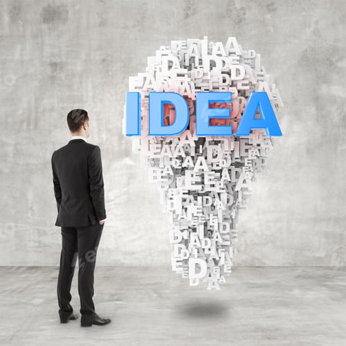 Preview: Young Man In Suit Looking To Idea Symbol