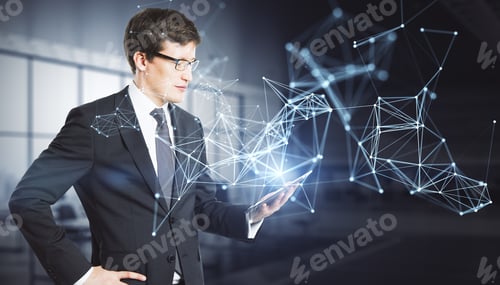 Preview: Attractive Young European Business Man Using Tablet With Abstract Polygonal Network Mesh Hologram