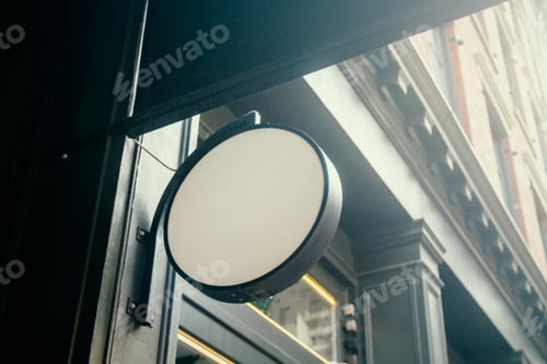 Preview: White Round Signage With Blank Space For Your Logo On The Loft Building Wall, Mockup