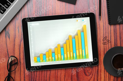 Preview: Business Graph On Digital Tablet Screen With Eyeglasses And Coffee Mug On Wooden Table
