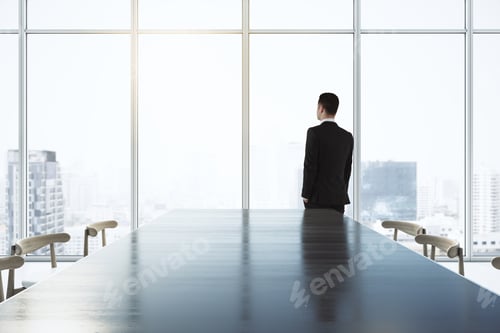 Preview: Future Vision Concept With Businessman Looking On City Skyscrapers Through Big Window In Spacious
