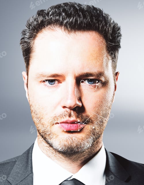 Preview: Portrait Of Handsome Young Businessman With Abstract Polygonal Tech Pattern On Face. Biometrics