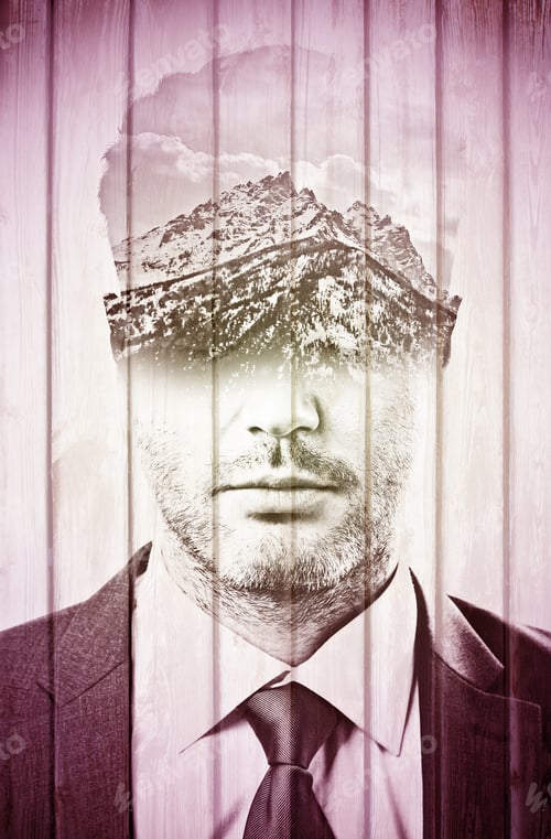 Preview: Double Explosure With Businessman Face And Mountains With The Sky