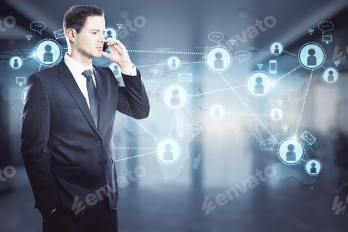 Preview: Attractive Young European Businessman On The Phone Standing In Blurry Office Interior With Glowing