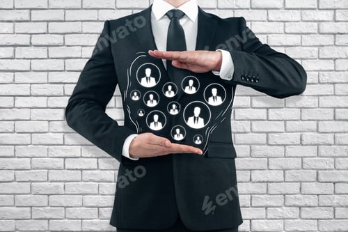 Preview: Businessman Holding Drawn Hr Icons On White Brick Wall Background. Hiring Concept