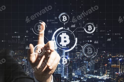 Preview: Close Up Of Businessman Hand Pointing At Abstract Bitcoin Hologram On Dark Night City Background