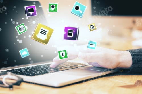 Preview: Businessman Hand Using Laptop With Glowing Social Media Icons Hologram. Global Business And Media
