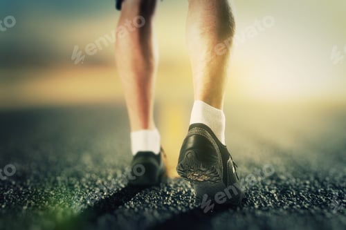 Preview: Runner Legs On The Road At Sunrise, Close Up