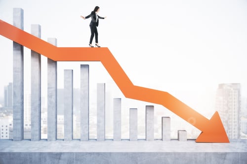 Preview: Business Woman Standing And Balancing On Abstract Red Downward Chart Arrow On Light City Background