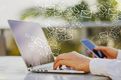 Preview: Close Up Of Male Hands Using Smartphone And Laptop At Desktop With Creative Drawn Email Icons On