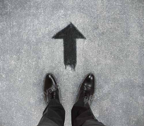 Preview: Top View Of Businessmen Feet On Concrete Floor With Drawn Arrow. Success Concept