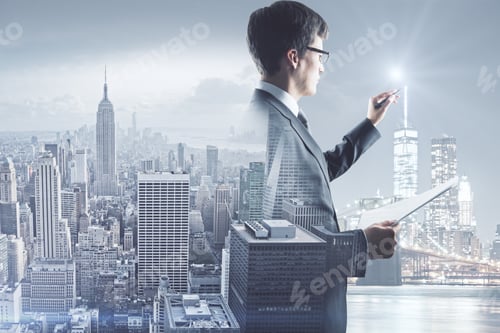 Preview: Side View Of Handsome Young Man Drawing Something And Holding Document On Abstract City Background