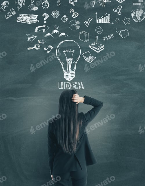Preview: Back View Of Thoughtful Young Businesswoman Standing On Chalkboard Wall Background With Business
